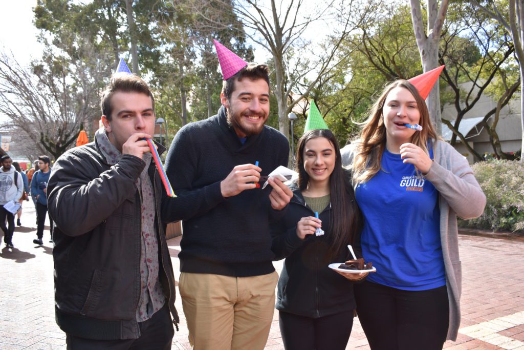 Students enjoy 50th anniversary cake